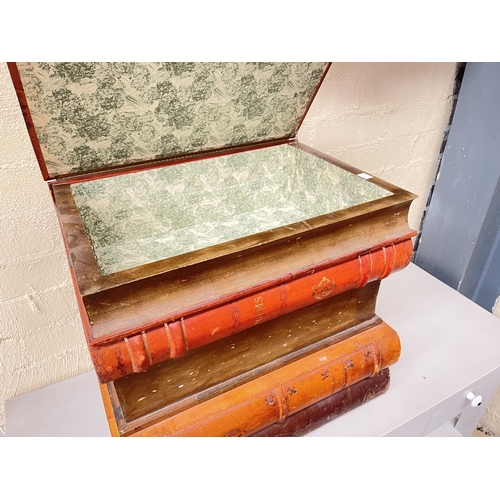 135 - Large faux stack of leather spine books, with lift up top box, and single drawer below, approx 52.5c... 