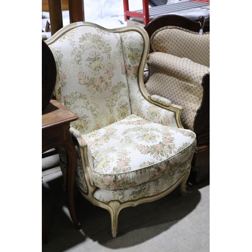 152 - Pair of French painted and gilt decorated framed wing lounge armchairs (2)