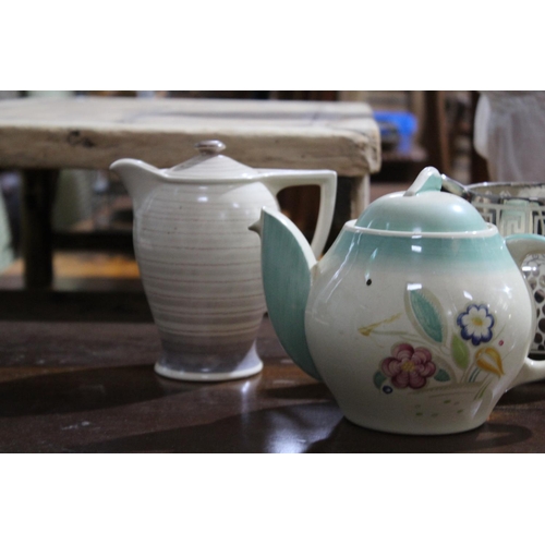 219 - Susie Cooper lidded jug, tea pot and Grays Pottery lustre jug, approx 20cm H and smaller (3)