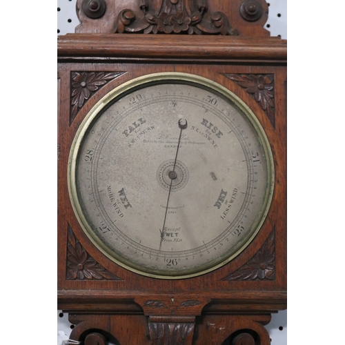 106 - Late Victorian carved oak banjo barometer, the silvered dial inscribed 'Casella, maker to the Admira... 