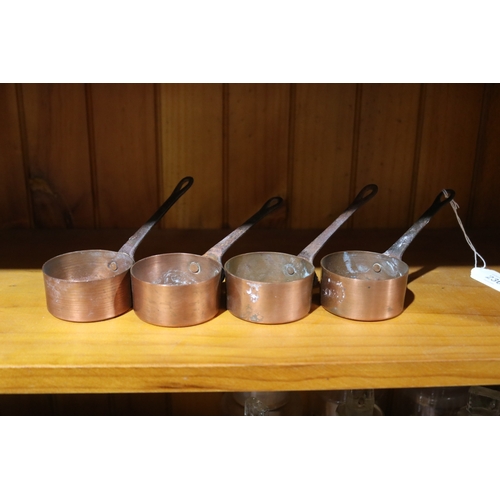 236 - Four French small copper saucepans, each 6cm Dia excluding handle (4)