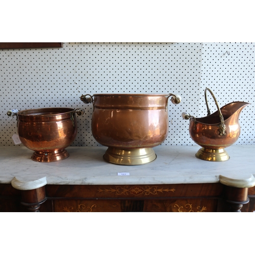 123 - Three French copper jardinières, with blue and white china handles, approx 25cm H x 29cm Dia and sma... 