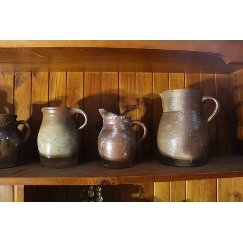 201 - Six large antique French pottery jugs, approx, 25cm H and shorter (6)