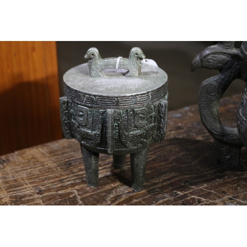 204 - Two Chinese ancient  bronze design lidded ice buckets, approx 22cm H x 35cm W and smaller (2)