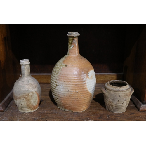 361 - Antique French pottery confit pot and two bottles, approx 27cm H and shorter (3)