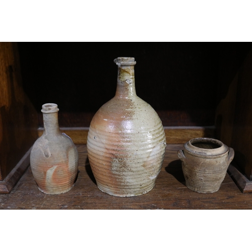 361 - Antique French pottery confit pot and two bottles, approx 27cm H and shorter (3)