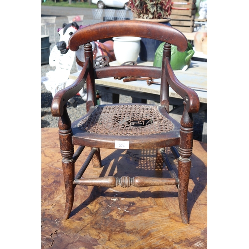 274 - Antique early 19th century English child's arm chair, caned seat