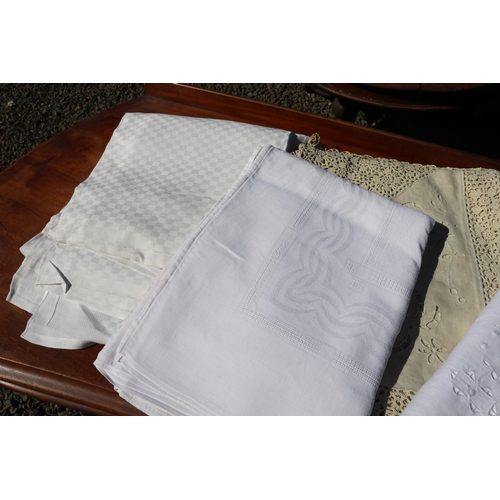 285 - Four French table cloths some with initials, please note there will be no measurements added for thi... 