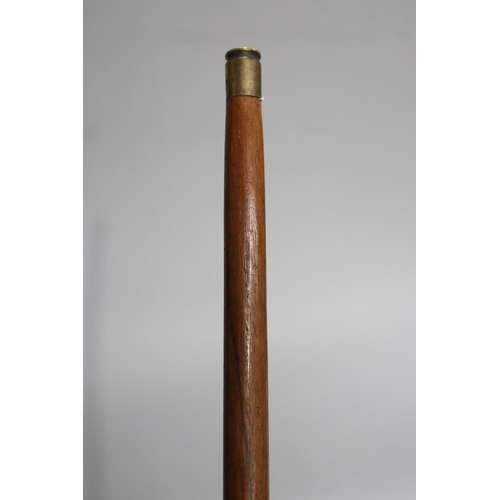 732 - Walking stick with bullet ends, approx 89cm L