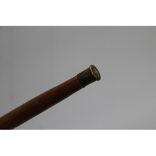 732 - Walking stick with bullet ends, approx 89cm L