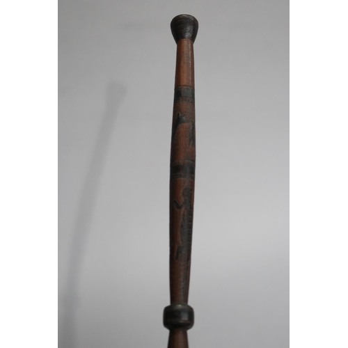 733 - Australian motif walking stick, approx 94cm L