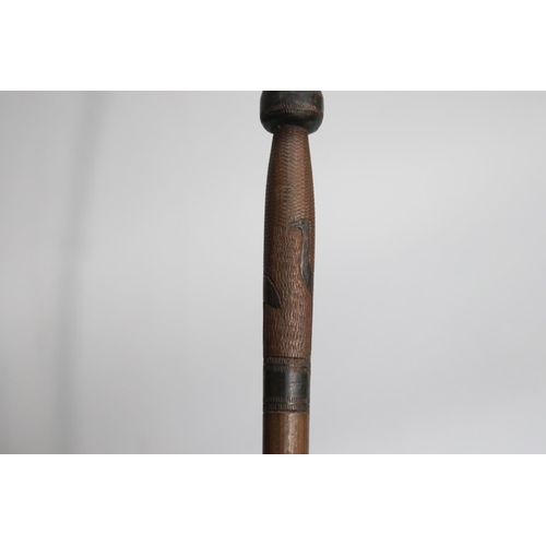 733 - Australian motif walking stick, approx 94cm L