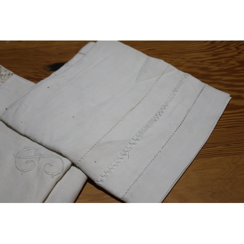 155 - Three pillow slips embroided with the letter 