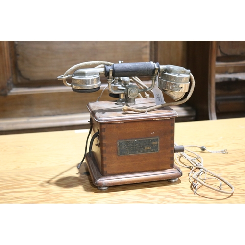 251 - Antique French desk top telephone, oak case with nickel plated mounts.