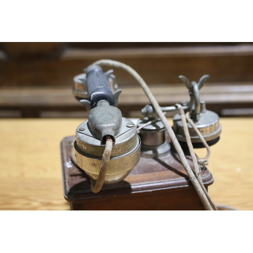 251 - Antique French desk top telephone, oak case with nickel plated mounts.