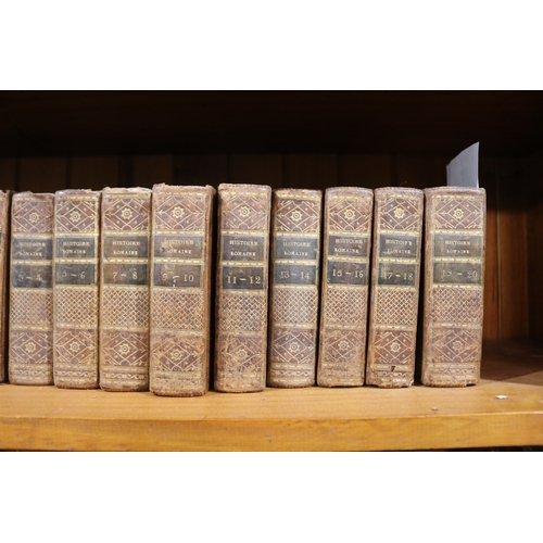 254 - Two sets of early antique French leather bound books, one set dated 1815 & the other dated 1830 both... 