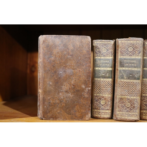 254 - Two sets of early antique French leather bound books, one set dated 1815 & the other dated 1830 both... 