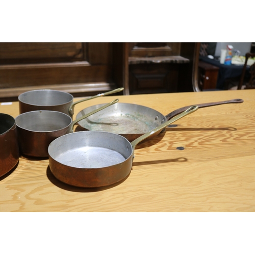 258 - Good lot of French copper saucepans, most with wrought iron handles, three with brass, approx 28cm D... 