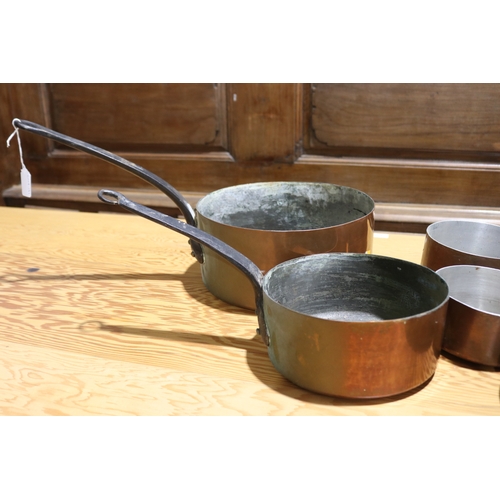 258 - Good lot of French copper saucepans, most with wrought iron handles, three with brass, approx 28cm D... 