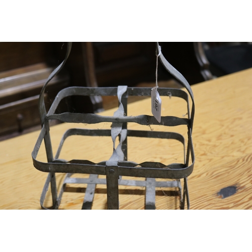 261 - Vintage French gal metal four bottle holder, approx 35cm H including handle x 21cm Sq