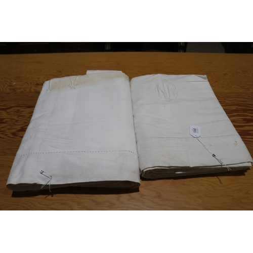 265 - Two antique linen sheets one embroidered with N.P and the other (Please note no measurements for thi... 