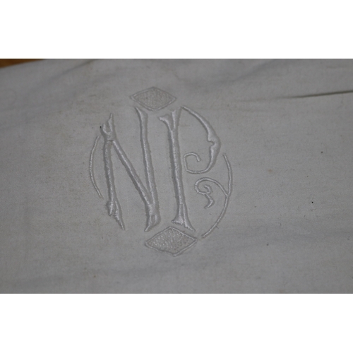 265 - Two antique linen sheets one embroidered with N.P and the other (Please note no measurements for thi... 