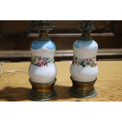 289 - Pair of antique French porcelain bodied oil lamps, converted to electric lights, each approx 51cm H ... 