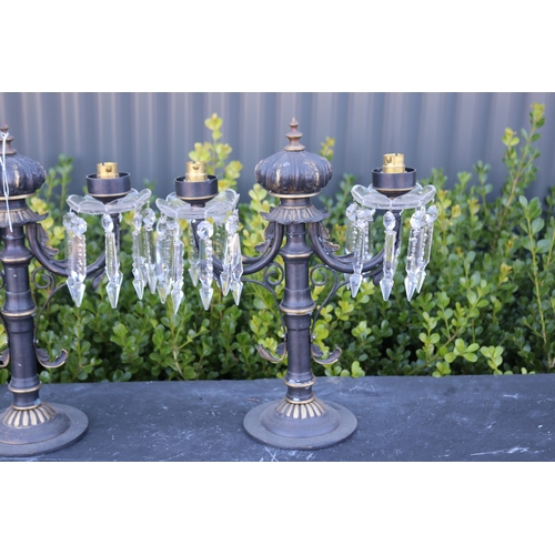 322 - Pair of two light painted brass candelabrum , with applied drop lustres, each approx 38cm H x 32cm W... 