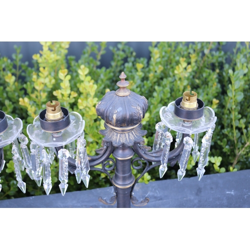 322 - Pair of two light painted brass candelabrum , with applied drop lustres, each approx 38cm H x 32cm W... 