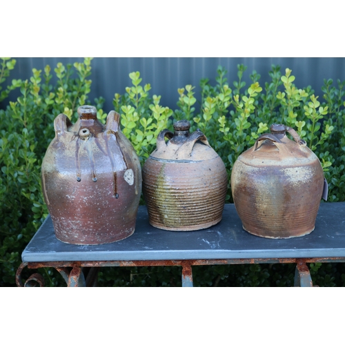 369 - Three antique French twin handled oil pots, approx 27cm H and shorter (3)