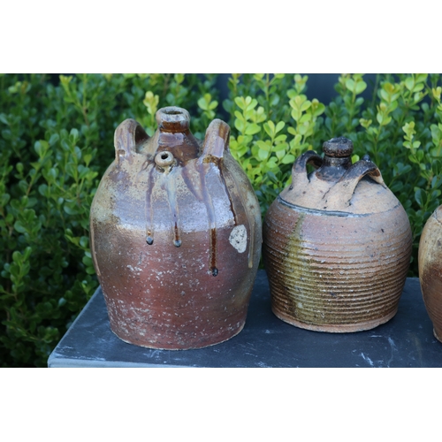 369 - Three antique French twin handled oil pots, approx 27cm H and shorter (3)