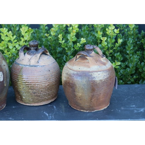 369 - Three antique French twin handled oil pots, approx 27cm H and shorter (3)