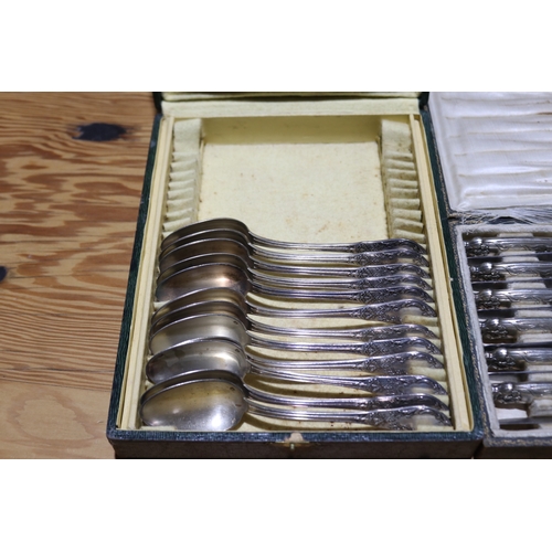 718 - Cased set of twelve French entree knives and a set of twelve spoons