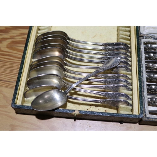 718 - Cased set of twelve French entree knives and a set of twelve spoons