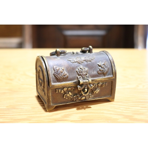 714 - Antique cast bronze domed top miniature casket, with carry handle to top, approx 7cm H (excluding ha... 