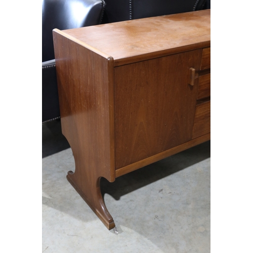 299 - 1960's English sideboard with two doors, three drawers to include a cutlery drawer, approx 77cm H x ... 