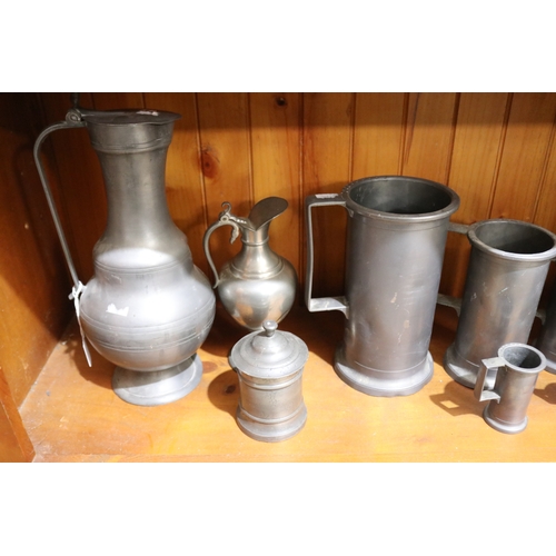 267 - Assortment of large antique French pewter to include measures, pitcher, cannister, etc, approx 37cm ... 