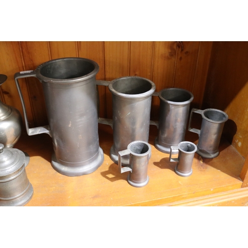 267 - Assortment of large antique French pewter to include measures, pitcher, cannister, etc, approx 37cm ... 