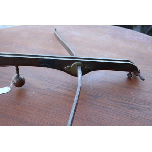 769 - Continental 19th century target crossbow of high quality. Heavy steel bow of 92cm, brass mounted woo... 