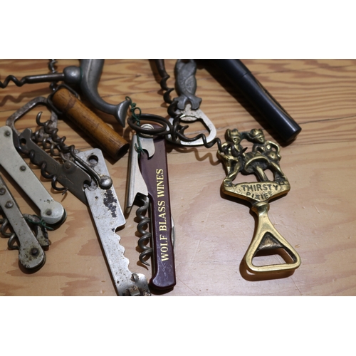 745 - Assortment of corkscrews and bottle openers