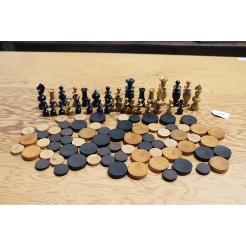 754 - Antique wooden carved chess set pieces and draughts