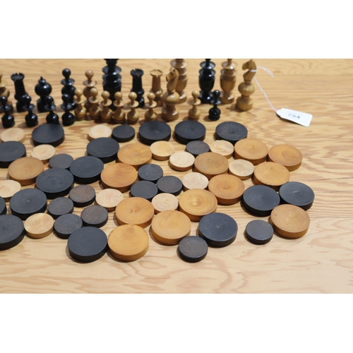 754 - Antique wooden carved chess set pieces and draughts