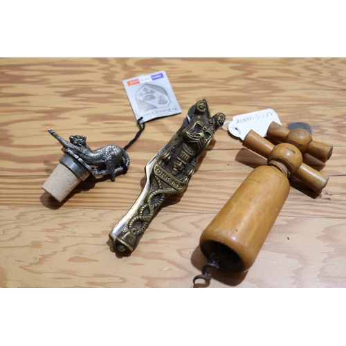 773 - Assortment, French cast metal cat decanter stopper, turned beech bottle cork screw, cast brass nut c... 