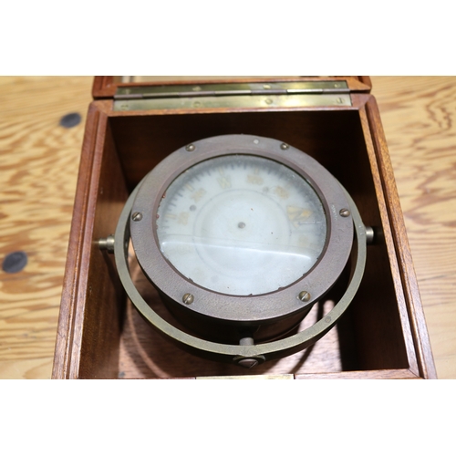 744 - Unmarked military grade boxed gimble compass. Brass hardware, with key. Box 20.cm x 20.5 cm Height 1... 