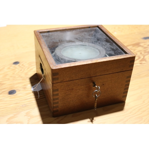 744 - Unmarked military grade boxed gimble compass. Brass hardware, with key. Box 20.cm x 20.5 cm Height 1... 