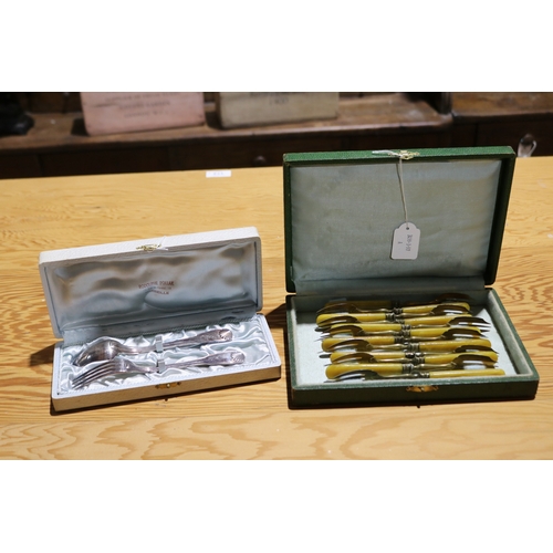 774 - Cased spoon and fork and a cased set of dessert forks (2)