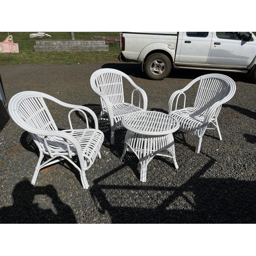 819 - Quality modern white painted cane patio or sunroom suite, comprising three arm chairs and table (4)