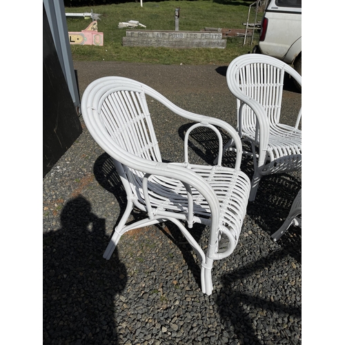 819 - Quality modern white painted cane patio or sunroom suite, comprising three arm chairs and table (4)