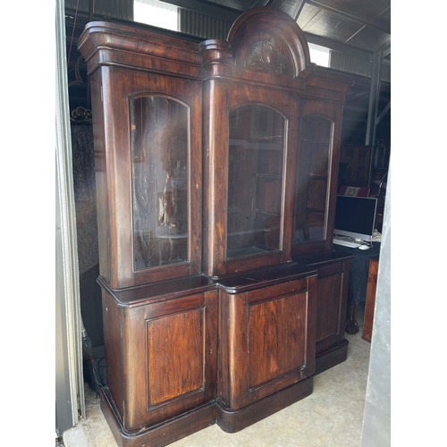 822 - Antique late Victorian mahogany break front three door two height bookcase, approx 236cm H at center... 