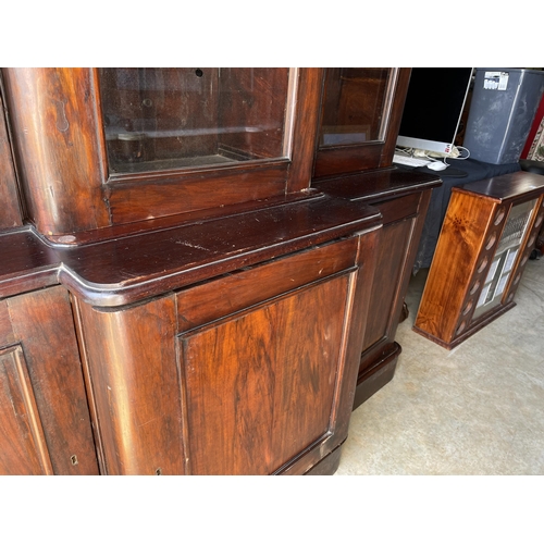 822 - Antique late Victorian mahogany break front three door two height bookcase, approx 236cm H at center... 